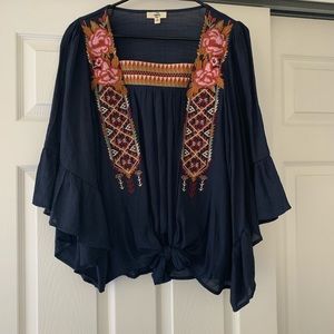 Navy embroidered blouse with bell sleeves. Size m